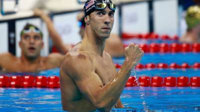Michael Phelps Reveals What It Would Take for Him to Swim Professionally Again - www.etonline.com - county Guthrie