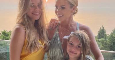 Amanda Holden and lookalike daughters beam in sunset snap on luxury holiday - www.ok.co.uk - Britain