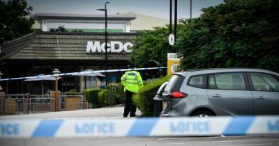 Man arrested over sex attack report after police taped off Snipe Retail Park - www.manchestereveningnews.co.uk - Manchester