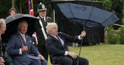 Boris Johnson leaves Prince Charles in hysterics as he suffers awkward umbrella malfunction - www.ok.co.uk - county Charles