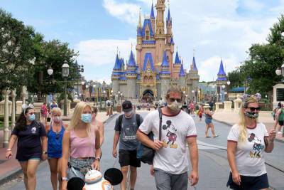 Disney World - Covid Vaccine - Disney - Disneyland, Disney World reinstate indoor masks amid COVID rise - nypost.com - California - Florida