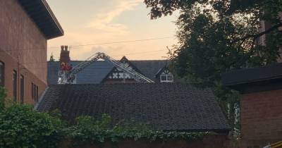 Man arrested after seven-hour standoff with police on the roof of a building in Whalley Range - www.manchestereveningnews.co.uk - Manchester