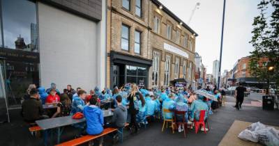 Moment soggy England fans sing 'why does it always rain on me' as heavens open ahead of Euro 2020 match - www.manchestereveningnews.co.uk - Manchester