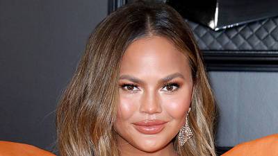 Chrissy Teigen Reveals Scars After Having Breast Implants Removed Last Year — Watch - hollywoodlife.com