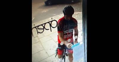 Mystery anti-mask cyclist caught on museum's CCTV covering Covid notice - www.manchestereveningnews.co.uk