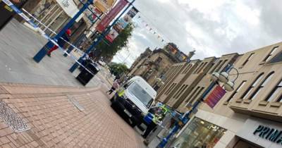 Police rush to Scots high street and cordon off area while probing incident - www.dailyrecord.co.uk - Scotland