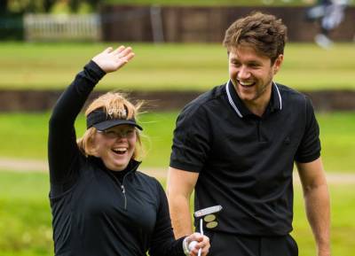 Dreams come true! Niall Horan joins super fan Amy Bockerstette for a round of golf in Co. Antrim - evoke.ie - USA