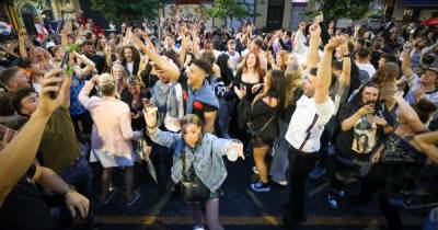 Crazy scenes in Manchester city centre as England fans celebrate win by having a 'full on rave' in the street - www.manchestereveningnews.co.uk - Manchester - Jordan - Ukraine - Rome