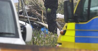 Police continue to search woodland after two handguns and ammo found - www.manchestereveningnews.co.uk