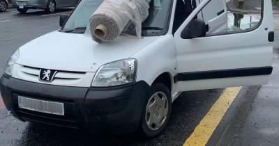 'It wasn't like that when I set off': Driver caught on the motorway with carpet covering windscreen - www.manchestereveningnews.co.uk