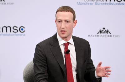 The Internet Reacts As Mark Zuckerberg Shares Bizarre Video Of Himself Riding An Electric Surfboard While Waving The U.S. Flag - etcanada.com