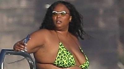 Lizzo Says Her Bikini Strings Got Lost During Fourth of July Party - www.justjared.com