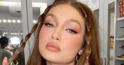 Supermodel Smile: Gigi Hadid’s Go-To Lip Plumping Gloss Is Only $7 - www.usmagazine.com