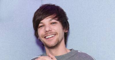 One Direction’s Louis Tomlinson makes fans swoon with edgy shoulder-length hair transformation - www.ok.co.uk