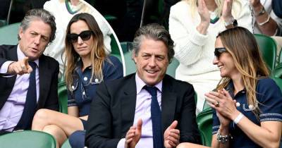 Hugh Grant, 60, has a giggle with Anna Eberstein, 41, at Wimbledon - www.msn.com