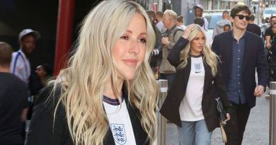 Ellie Goulding sports an England shirt as she arrives at Wembley - www.msn.com