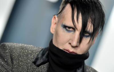Marilyn Manson turns himself into police for alleged spitting incident in New Hampshire - www.nme.com - Los Angeles - Hollywood - state New Hampshire