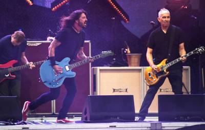Watch Foo Fighters invite fan on stage in Kansas to play ‘Monkey Wrench’ - www.nme.com - state Kansas