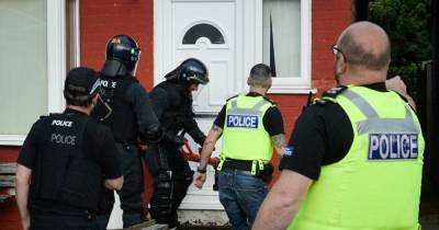 Hundreds of police officers storm 28 homes in force's 'largest ever' blitz on crime gangs and county lines - www.manchestereveningnews.co.uk - Manchester