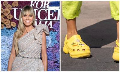 Heidi KIum joined in on the Croc trend by wearing a bright yellow platform pair - us.hola.com - Italy