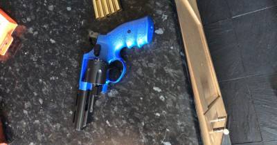 Two men arrested after drugs and imitation gun found in reaid on Wigan property - www.manchestereveningnews.co.uk - city Canberra
