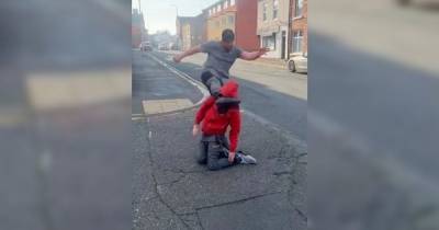 Shocking video shows dad giving 'savage beating' in 'love triangle' street fight - www.manchestereveningnews.co.uk - Manchester