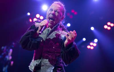 Iron Maiden’s Bruce Dickinson tests positive for COVID-19 - www.nme.com - Britain