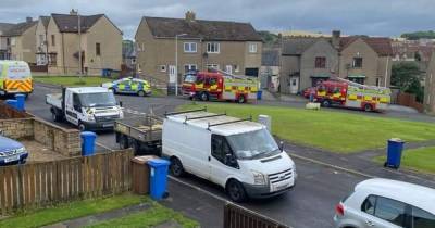 Two men and woman arrested after riot cops storm Fife property - www.dailyrecord.co.uk