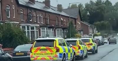 'Armed police' rush to scene as 'man threatens woman with handgun' - www.manchestereveningnews.co.uk - county Lane - county Coke