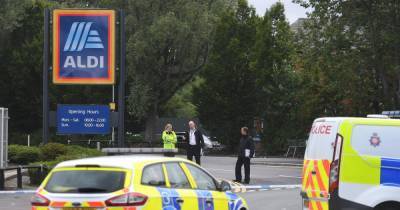 Mass brawl breaks out in Aldi car park as woman seriously injured - www.dailyrecord.co.uk - Manchester