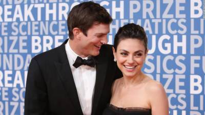 Ashton Kutcher and Mila Kunis prove their family is actually in favor of showering - edition.cnn.com