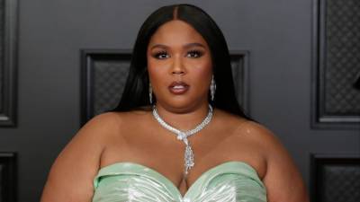 Lizzo Tearfully Calls Out 'Fatphobic' and 'Racist' Haters After Release of 'Rumors' Song - www.etonline.com