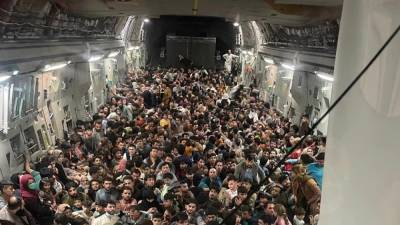 Shocking Photo Shows 600 Afghans Crammed Inside US Military Plane - thewrap.com - USA - Afghanistan - city Kabul