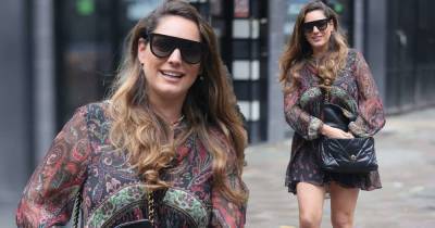 Kelly Brook puts on a leggy display in a paisley dress at Heart FM - www.msn.com