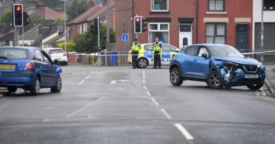 Man arrested on suspicion of drink driving after two people injured in Tameside crash - www.manchestereveningnews.co.uk - county Lane