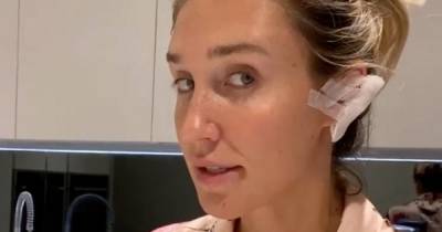 Megan McKenna wears bandages after piercings cause her earlobes to become infected - www.ok.co.uk
