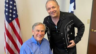 Texas Gov Greg Abbott Tests Positive for COVID Hours After Photo Op With Unmasked Music Star - thewrap.com - Texas