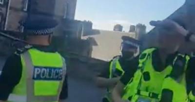 Man arrested after protesters try to 'take back' Edinburgh Castle - www.dailyrecord.co.uk
