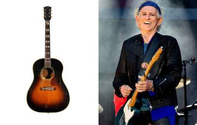 Keith Richards once shot a hole in his guitar and it’s now up for auction - www.nme.com - city Memphis - county Wood - county Gibson