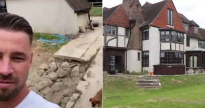 Katie Price's 'mucky mansion' reduced to piles of rubble as Carl Woods shares video - www.ok.co.uk