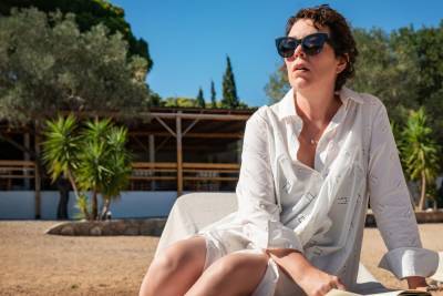 Olivia Colman And Dakota Johnson Go On Vacation In First Images From Maggie Gyllenhaal’s ‘The Last Daughter’ - etcanada.com