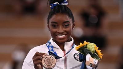 Simone Biles Talks 'Overwhelming' Support and Her Emotional Olympic Memories Ahead of 'GOAT' Tour (Exclusive) - www.etonline.com - Tokyo