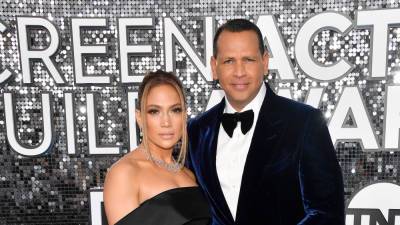 Alex Rodriguez poses with the Porsche he once gifted ex Jennifer Lopez - www.foxnews.com