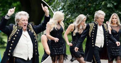 Rod Stewart surrounded by glamorous blondes as he films music video - www.msn.com