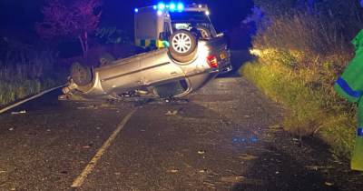 Car flips onto roof after late night crash on Scots road as driver and passenger taken to hospital - www.dailyrecord.co.uk - Scotland
