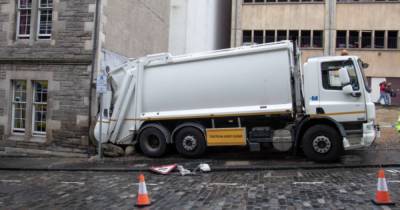 Bin lorry smashes into parked car before crashing into Edinburgh hotel - www.dailyrecord.co.uk