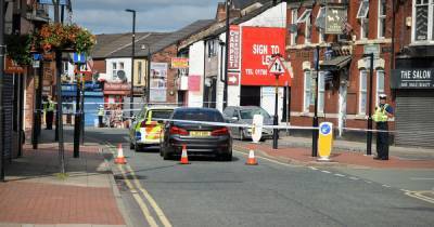 Pedestrian in hospital with 'trauma injuries' after crash shuts main road for hours - www.manchestereveningnews.co.uk
