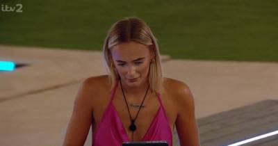 Love Island's Millie cringes as Laura Whitmore pokes fun at her piano skills - www.ok.co.uk