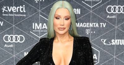 Iggy Azalea Is ‘Hell-Bent Focused’ on the Beauty Industry for the Next Year or Two - www.usmagazine.com