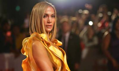 Jennifer Lopez sizzles in a neon cutout dress that will blow your mind - hellomagazine.com - USA